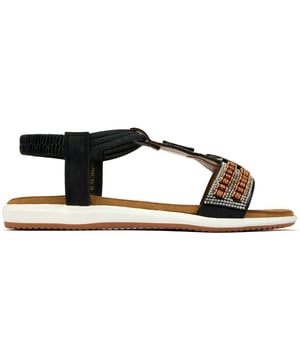 Descubra las sandalias Lotus Bertolini, donde el lujo se une a la comodidad. Estos elegantes zapatos de verano cuentan con una elegante parte superior con bonitos detalles decorativos para mayor glamour, una correa trasera elástica y una suela de goma duradera. Diseñados tanto para la diosa del sol vanguardista como para el creador de tendencias informal, ofrecen un ajuste cómodo con un aspecto fabuloso.