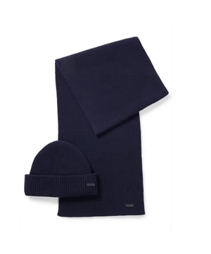 ribbed all over scarf  - matching hat with nice fully fashioning and fake leather plaque - sold in a gift box - responsible style