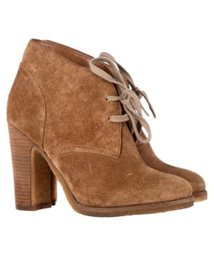 VINTAGE, RRP AS NEW
The See by Chloé Lace-Up Ankle Heeled Boots in Brown Suede are a perfect blend of rugged charm and feminine elegance. Crafted from premium brown suede, these boots feature a classic lace-up design that offers an adjustable fit, while the chunky heel provides both comfort and stability without compromising on style. The soft suede texture gives them a luxurious feel, while the sleek silhouette and versatile color make them a wardrobe staple for the fashion-conscious. Whether you're stepping out for a casual day or an evening event, these boots effortlessly elevate any look.

Styling Tip:
Pair the See by Chloé Lace-Up Ankle Heeled Boots with a flowing midi dress for a stylish contrast of soft and structured elements. The rich brown suede beautifully complements earthy tones like mustard, beige, or olive green, adding warmth to your outfit. Alternatively, wear them with skinny jeans and a leather jacket for an edgy, chic look that transitions easily from day to night. These boots are the perfect choice for adding a touch of modern sophistication to your fall and winter wardrobe.

 See by Chloé Lace-Up Ankle Heeled Boots in Brown Suede

Condition: Very good
Signs of wear: Minor markings, Lightly used but very well maintained. Minor mark at soles & creasing, light scuffing at the soles and heels.
Packaging: Dust bag
Color: Brown | ochre
Material: Suede | suede
Size: EU | 37
Measurements: Heel height: 95; Insole length: 280
SKU: NAPPUGBSH455865W