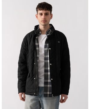 This windcheater jacket, crafted in a diamond quilted pattern, is made entirely from recycled polyester with a water-repellent finish. Designed in a mid-length regular fit, it features a stand collar and a front placket with press buttons over a hidden zip closure. Additional details include side hand-warmer pockets, lower flap pockets, and two interior pockets. Finished with branded embroidery at the chest and back locker loop, this jacket combines functionality with style. 


Regular fit
Mid-length
Water-repellent (DWR treatment)
Diamond quilted design


 Shell - 100% Recycled Polyester, Lining - 100% Recycled Polyester, Body -100% Recycled Polyester 

7006497
 
 