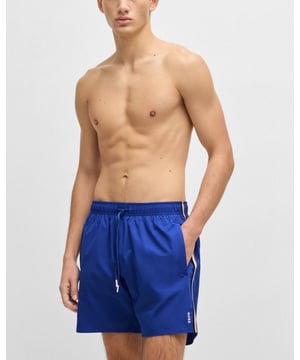 Fully lined swim shorts by BOSS, detailed with signature stripes and a logo.
100% Polyester (recycled) , Lining: 100% Polyester
50491594