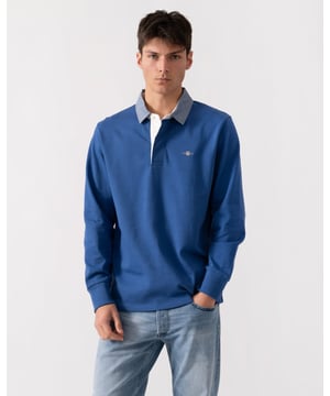 With a small-scale GANT shield graphic embroidered at the chest, this heavy rugger is made from 100% cotton and tailored for a regular fit. Its timeless, classic look is enhanced by a classic twill collar and a hidden button placket, making it versatile enough for any occasion.



Regular fit
Twill collar
GANT graphic embroidered at chest
Wash with similar colors.

 100% Cotton 
 
2004082


 