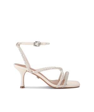 This Carvela Ravello High heel is crafted from a bone leather alternative which is embellished with crystals and faux pearls. There is a silver buckle fastening the ankle straps. Heel height: 8cm. This product features All Day Long technology.