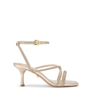 This Carvela Ravello High heel is crafted from a gold leather alternative which is embellished with gold crystals. There is a gold buckle fastening the ankle straps. Heel height: 8cm. This product features All Day Long technology.