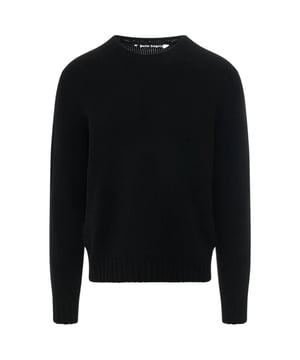 Experimente una comodidad acogedora y una sofisticación informal con el suéter negro con cuello redondo de Palm Angels. Adornado con un elegante logotipo, este suéter ultrasuave está diseñado para ofrecer calidez durante todo el día y un estilo atemporal. Haz una declaración con este suéter de ajuste relajado, ¡perfecto para el uso diario!, Corte estándar, Jersey negro, Diseño estampado con logo curvo de Palm Angels, Jersey de punto negro, 80 % lana, 20 % poliamida, Hecho en Italia, Cinturilla y terminaciones de mangas elásticas, Prendas de punto negras