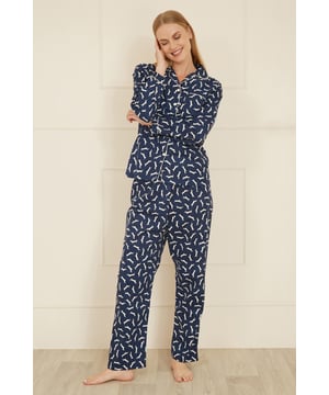 We are ready for cosy nights in on the sofa and think these PJ's are the perfect companion for that! Great for gift giving in the Christmas season. A button up pair of pyjamas, made from soft brushed cotton - Covered in cute Dachshunds!