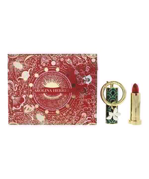The Carolina Herrera Fabulous Kiss 3-Piece Gift Set is a luxurious lip care ensemble that combines elegance with functionality. This set features the iconic Satin Red 310 Lipstick, renowned for its rich, creamy texture and vibrant colour payoff. The lipstick is encased in the Jasmine Charm cap, adorned with a delicate jasmine flower motif, adding a touch of floral elegance. Completing the set is the Green Waves Cap, offering a sleek and modern design that complements the overall aesthetic. This gift set is perfect for those seeking a sophisticated lip care experience, combining high-quality makeup with exquisite design.  Key Features:  Satin Red 310 Lipstick: Provides intense colour and a satin finish for a sophisticated look.  Jasmine Charm Cap: Features a jasmine flower motif, adding a touch of elegance.  Green Waves Cap: Offers a sleek, modern design that complements the lipstick.  How to Use:  Preparation: Ensure lips are clean and exfoliated.  Application: Apply the Satin Red 310 Lipstick directly to the lips, starting from the centre and moving outward.  Enhancement: For added definition, use a lip liner in a matching shade.  This gift set is ideal for those who appreciate luxury and design, offering a complete lip care solution that combines functionality with aesthetic appeal.