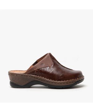 Estos zapatos están fabricados por nosotroscon piel de vaca muy duradero. La práctica cremallera sirve para una sujeción firme en el zapato. Un método de producción típico de JOSEF SEIBEL es el cosido preciso a mano. Gracias al ancho G estos clogs ofrecen gran amplitud para los pies normales. Catalonia 48 le da la libertad de seguir su propio camino.