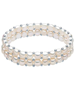 With this graceful bracelet from Valero Pearls, you do not need to choose between gentle pearl shimmer and cool metal gloss, because it masterfully combines both jewelry properties in one! His refined layer look makes it a striking accessory on her wrist, in which rows of high-quality freshwater breeding breeds with small decorative balls made of high-gloss polished 925 sterling silver alternate. Due to the flexible design, the piece of jewelry is not broken by any closure, which would only disturb the harmonious continuity of the pearl splendor.