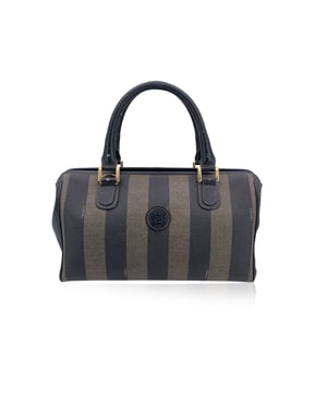 VINTAGE, RRP AS NEW
Discover the charm of timeless Italian craftsmanship with the Fendi Vintage Pequin Striped Vinyl Canvas Mini Boston Bag. This elegant mini bag features the iconic striped Pequin tobacco canvas, a signature pattern that effortlessly blends classic sophistication with a touch of playful charm. The black leather trim and handles add a luxurious contrast, highlighting the bag's refined structure.  The double top handles offer a comfortable grip, while the upper zipper closure keeps your essentials secure. Inside, the black leather lining complements the exterior, and a convenient side zip pocket provides extra storage for your smaller items.  Designed with versatility in mind, the bag includes two metal loops, allowing you to attach a shoulder strap (not included ) for hands-free ease. The 'Fendi s.a.s. Roma - Made in Italy' embossed inside serves as a mark of ity and showcases the brand's dedication to exceptional Italian craftsmanship. Whether you carry it by hand or use the shoulder strap, this Fendi Pequin Mini Boston Bag is the perfect blend of style and practicality, destined to be a treasured part of your collection. Condition Rating: B - VERY GOOD CONDITIONCondition Details: Gently used. Minimal wear of use on leather trim and handles due to normal use. Minimal wear of use on the hardware. The original shoulder strap is missing. Please check the photos carefully and ask if you need to know more details or if you have any doubts.Measurements (cm):Depth: 14.0Height: 17.8Length: 30.5Other Details: Dustbag? NoKeys? NoBox? No Measurments:  width: 140 mm length: 305 mm height: 470 mm