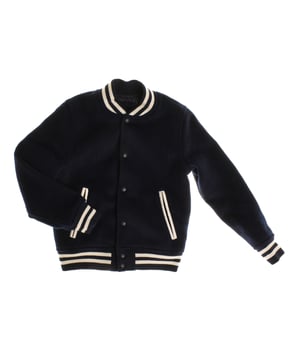 Classic baseball jacket for children, ideal for a casual and sporty style.

 Made from a soft, warm fabric, it provides comfort and warmth on the coolest days.

 The design includes a front closure with snap buttons, which makes it easy to put on and ensures a comfortable fit.

 Striped ribbed details on the collar, cuffs and waist add that iconic baseball jacket touch.

 Additionally, it features slanted side pockets that offer space for small items, maintaining functionality without compromising style.

 This jacket is perfect for children looking for a versatile and comfortable garment, with that sporty and youthful style that never goes out of style.
 Composition: Shell: 48% Polyester, 47% Wool, 5% Other fibers; Lining: 100% Polyester
 Care:
- Hand wash.
 - Do not use a dryer.
 - Iron with caution.
 - Save correctly.