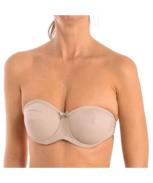 The Lena invisible non-padded underwire bra is designed to offer discreet support and all-day comfort. Its non-padded design enhances the natural shape of the bust, while its invisible structure makes it ideal for tight-fitting clothing.

 Characteristics:
 - Invisible unpadded bra that enhances the natural shape of the bust without being visible under tight clothing.
 - Strapless women's bra, ideal for garments with bare shoulders or sleeveless necklines.
 - Bra with supportive underwire that provides additional support and firmness.
 - Adjustable back closure allows for a custom fit for added comfort.
 - Bra with transparent back, it has a back band made of transparent material that makes it perfect for garments with an open back or made of translucent materials.
 - Includes a small decorative bow in the center, providing a delicate touch.
 - Soft and lightweight fabric that guarantees comfort and breathability.


 The Lena invisible non-padded underwire bra is perfect for women looking for an intimate garment that combines comfort, functionality and style, ensuring a natural and smooth silhouette on any occasion.
 Composition: 84% Polyamide, 16% Elastane
 Care:
Wash at maximum temperature 30º.
 Do not iron.
 Do not use bleach.
 Do not tumble dry.
 Do not dry clean.