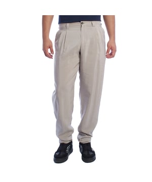 Chino pants from Emporio Armani, designed for those looking for a perfect combination of elegance and contemporary style.

 Characteristics:

 - Fit: Tapered fit, with front darts that add structure and a comfortable fit at the top, narrowing towards the ankles for a modern and streamlined silhouette.
 - Closure: Button and zipper, ensuring practicality and ease of use.

 Pockets:

 - Two functional side pockets.
 - Back welt pockets with button closure highlight the clean and sophisticated design.

 - Style: Minimalist and versatile design, ideal for combining on casual or semi-formal occasions.

 A pair of trousers that stands out for its impeccable and refined workmanship, perfectly adapting to the modern man.
 Composition: Fabric: 76% Silk, 24% Polyamide
 Care:
- Machine wash on gentle cycle.
 - Use similar colors in the wash.
 - Avoid the use of bleaches.
 - Dry at low temperature in the dryer.
 - Iron at low temperature.
 - Do not dry clean.