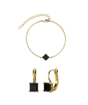 Composición: Latón Acabado: Chapado en Oro de 18k Tipo de Piedra: Cristal Austriaco Número de Piedras (uds): 3 Color de Piedra: Negro Largo de Pulsera (mm): 170 + 50 Largo de Pendientes (mm): 7.25