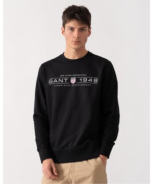 This GANT sweatshirt, made entirely of a soft cotton blend, offers both comfort and style. Designed with a regular fit, it features a classic crew neck, ribbed detailing at the cuffs and hem and a GANT graphic printed on the chest for a vintage look.
 

Regular fit
Crew neck
Ribbed hem, neck and cuffs
GANT graphic printed at chest

 
 80% Cotton, 20% Polyester (Recycled Fibres) 

2044016