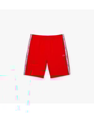 Men's Lacoste Cotton Flannel Shorts.- Regular fit, straight cut: Timeless.- Branded drawstring at waist: Adjustable. It's all in the details.- Side pockets, branded stripe down sides: Little details that make a big difference.- Embroidered crocodile on front: Our authentic signature.- Brushed cotton flannel with fleece lining: Super-soft. Material: 80% Cotton, 20% Polyester. Ref: GH5074S5H.