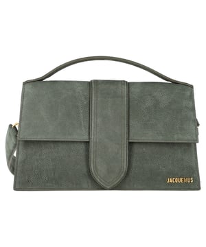 VINTAGE, RRP AS NEW
The Jacquemus La Montagne Le Grand Bambino Bag in Green Leather is a chic and practical addition to any wardrobe. Crafted from premium cowhide suede, this bag boasts a structured silhouette that enhances its sophisticated charm. The fold-over flap with a magnetic snap ensures easy access, while the patch interior pockets provide convenient storage for essentials. It features polished gold-tone hardware, adding a luxurious touch. With an optional, adjustable strap, this bag can be worn crossbody or over the shoulder, making it versatile for any occasion. The textile lining completes the design, offering a refined finish.




Jacquemus La Montagne Le Grand Bambino Bag in Green Leather