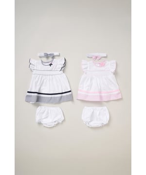 This two pack outfit set by Rockabye Baby Boutique includes two sweet dresses, matching knickers, and coordinating bow headbands. Perfect for special occasions or everyday wear, this set combines style, comfort, and playful detail for your little one’s wardrobe.