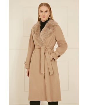 Winter is coming and we couldn't be more excited for coat season! This wrap around beauty with faux fur collar is super versatile, and looks stunning, Pockets and a tie belt ensure this coat is not only chic, but practical too In a midi length to keep you cosy.