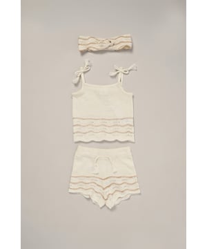 This adorable set by Miss includes a true knit top, comfy shorts, and a matching headband. Perfect for warm days, it combines style and practicality, making it an ideal choice for playdates, outings, or casual summer looks.