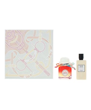Hermes Twilly D'Hermes Tutti 2 Piece Gift Set includes the elegant Eau De Parfum and a nourishing Moisturizing Body Lotion. The fragrance is a vibrant and playful blend of litchi at the top, bringing a fresh, fruity sweetness. The heart reveals the delicate and spicy essence of ginger flower, which adds warmth and depth. Finally, the base is rounded off with musk, providing a soft, sensual finish. This set offers a full sensory experience, with the body lotion complementing the fragrance by leaving your skin feeling smooth and delicately scented, perfect for daily wear.