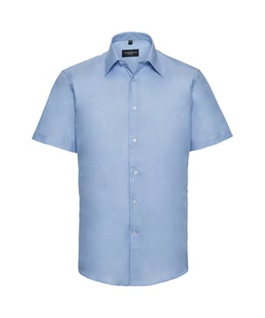 70% Baumwolle, 30% Polyester. Design: Unifarben. Knopfverschluss. Abgerundeter Saum. Länge: Regulär. Mit Kragen. Kurzärmlig.