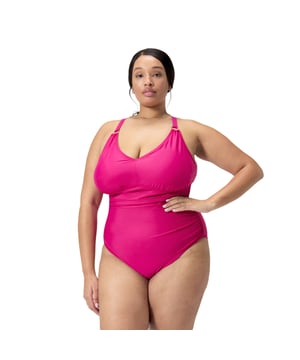Womens Speedo Shaping V-Neck Plus 1 Piece Swimsuit in pink.Love your holiday look wearing our beautiful magenta-coloured Shaping Swimsuit  available in extended sizes with a pretty V neckline and figure-flattering ruching. Embossed gold branding upgrades your beach style  while removable bra pads offer support  and the adjustable cross-back straps ensure a great fit. Cut from our premium  comfortable body-shaping fabric  which works to smooth and contour the body  it’s ideal for the beach or pool. Offering higher chlorine resistance than standard swimwear fabrics  the fabric fits like new for longer with CREORA® HighClo™. Ref: 800403115351Please note that returns will only be accepted if the hygiene label is still attached to the product.