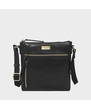 The Assots timeless design 'Rue' crossbody bag is beautifully handcrafted from the finest Italian finish genuine leather. Effortlessly stylish, this real leather crossbody features four zip pockets to organise your essentials when you're out and about. Ideal as an everyday bag, the 'Rue' is a must-have addition to your collection of luxurious leather handbags. Secured zip top closure opens to a fully lined and roomy interior. Pure cotton fabric lining used in natural beige making it a free from plastic product. Secured two zip pockets at the front to slide in your essentials such as face covering, smart phone and more. Back zip pocket for quick and easy access to your essentials. Adjustable long webbing shoulder strap handle for a comfortable carry. Lightweight. Adorned with the inimitable Assots London clean finish gold metal logo at the front. Fittings colour: Antique Brass. Composition: Body: 100% Genuine Leather. Lining: Pure Cotton. DISCLAIMER: All pictures shown are for illustration purposes only. Actual product colour may vary due to different ambience lighting or the screen display settings. Size- W22cm x H21cm x D3cm.