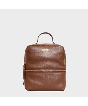 Made from premium pebble grain real leather, the 'Ella' mini backpack is a luxurious option from Assots London. Work, or evening drinks, weekends away or shopping around town, the hands-free genuine leather backpack adds a touch of sophistication to all your outfits. A timeless favourite in a sleek, minimalistic and beautiful finish with adjustable shoulder straps for a comfortable fit whenever needed.
Zip top closure opens to a fully lined capacious main compartment offers plentiful on-the-go storage. Zip pocket at the front for quick and easy access when you're out and about. Eyelet opening at the rear for easy earphone use with your smartphone secured inside the bag. Top grab handle for easy pick-up and go. Adjustable soft leather shoulder strap for a comfortable carry. Adorned with an Assots London brushed gold clean finish logo demonstrating its premium quality. Additional internal slip-in pocket for your smartphone and keys. Fittings Colour: Antique Brass. Composition: Body: 100% Genuine Leather. Lining: Polyester.
DISCLAIMER : All pictures shown are for illustration purpose only. Actual product colour may vary due to different ambience lighting or the screen display settings. Size- W24cm x H22cm x D8cm.