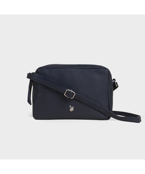 Redefine elegance with the ‘Avon’ soft Nappa leather crossbody bag, a perfect fusion of luxury, craftsmanship, and practicality. Expertly handcrafted from the finest full-grain soft Nappa leather, this premium bag is designed for those who appreciate timeless sophistication and effortless style. Whether you're heading to work, a casual outing, or an evening event, the ‘Avon’ crossbody bag is your go-to accessory for effortless sophistication and refined style. Premium Full-Grain Nappa Leather – Crafted from the softest and most supple genuine leather, offering a luxurious touch and exceptional durability. Smart & Functional Design – Double zipped compartments for easy organisation and secure storage. Spacious interior to accommodate your daily essentials with ease. Adjustable Leather Shoulder Strap – Designed for custom comfort, allowing you to wear it as a crossbody or shoulder bag. Lightweight & Versatile – A perfect everyday companion, seamlessly blending style and functionality. Signature Assots ‘Swan’ Collection – Embellished with the iconic ‘Swan’ logo, symbolising elegance, grace, and superior craftsmanship. Additional Internal Features - Slip-in pocket for your mobile phone, car keys and house keys. Fittings Colour: Silver. Composition: Body: 100% Genuine Leather, Lining: Polyester. Size: 14cm x 20cm x 7cm
