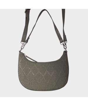Indulge in luxury with the Assots Premium 'Wonder Weave' Real Leather Woven Designer Shoulder Crossbody Bag. Meticulously crafted with articulate weaving, this bag exudes sophistication and perfection. Its artisanal slot weave creates a unique sense of movement and texture, making it a versatile and luxurious everyday companion. Its versatile design allows it to be worn as a crossbody or shoulder bag, with detachable handles for convenience. Beautiful diamond shaped weaving with the finest full grain genuine leather. Detachable shoulder and crossbody handles to be worn as a crossbody bag or a shoulder bag. Lightweight. Secured zip closure opens to a fully lined and roomy compartment to accommodate all your essentials. Internal zip pocket for your smartphone, house keys and car keys. Available in 13 more elegant colours. Fittings Colour: Silver Nickel. Composition: Body: 100% Genuine Leather, Lining: Polyester. DISCLAIMER: All pictures shown are for illustration purpose only. Actual product colour may vary due to different ambience lighting or the screen display settings. Size- W29cm x H18cm x D8cm.