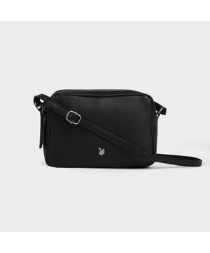 Redefine elegance with the ‘Avon’ soft Nappa leather crossbody bag, a perfect fusion of luxury, craftsmanship, and practicality. Expertly handcrafted from the finest full-grain soft Nappa leather, this premium bag is designed for those who appreciate timeless sophistication and effortless style. Whether you're heading to work, a casual outing, or an evening event, the ‘Avon’ crossbody bag is your go-to accessory for effortless sophistication and refined style. Premium Full-Grain Nappa Leather – Crafted from the softest and most supple genuine leather, offering a luxurious touch and exceptional durability. Smart & Functional Design – Double zipped compartments for easy organisation and secure storage. Spacious interior to accommodate your daily essentials with ease. Adjustable Leather Shoulder Strap – Designed for custom comfort, allowing you to wear it as a crossbody or shoulder bag. Lightweight & Versatile – A perfect everyday companion, seamlessly blending style and functionality. Signature Assots ‘Swan’ Collection – Embellished with the iconic ‘Swan’ logo, symbolising elegance, grace, and superior craftsmanship. Additional Internal Features - Slip-in pocket for your mobile phone, car keys and house keys. Fittings Colour: Silver. Composition: Body: 100% Genuine Leather, Lining: Polyester. Size: 14cm x 20cm x 7cm