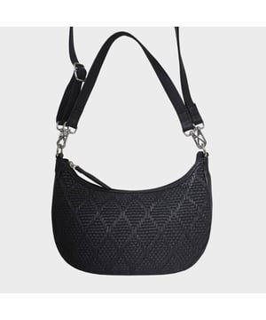Indulge in luxury with the Assots Premium 'Wonder Weave' Real Leather Woven Designer Shoulder Crossbody Bag. Meticulously crafted with articulate weaving, this bag exudes sophistication and perfection. Its artisanal slot weave creates a unique sense of movement and texture, making it a versatile and luxurious everyday companion. Its versatile design allows it to be worn as a crossbody or shoulder bag, with detachable handles for convenience. Beautiful diamond shaped weaving with the finest full grain genuine leather. Detachable shoulder and crossbody handles to be worn as a crossbody bag or a shoulder bag. Lightweight. Secured zip closure opens to a fully lined and roomy compartment to accommodate all your essentials. Internal zip pocket for your smartphone, house keys and car keys. Available in 13 more elegant colours. Fittings Colour: Silver Nickel. Composition: Body: 100% Genuine Leather, Lining: Polyester. DISCLAIMER: All pictures shown are for illustration purpose only. Actual product colour may vary due to different ambience lighting or the screen display settings. Size- W29cm x H18cm x D8cm.