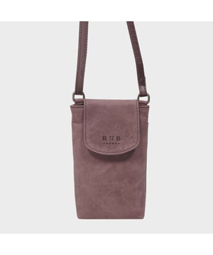 The 'Thea' mobile phone crossbody bag is an elegant and practical mobile phone crossbody bag crafted from the finest genuine leather. Magnetic closure and a flap design give effortless and secure access, while its adjustable shoulder handle allows you to customize the fit. Perfect for your everyday needs!
Secured magnetic flap closure opens to a fully lined interior. Adjustable leather shoulder handle for a comfortable carry. Full length secured back zip pocket to slide in your essentials when you're out and about. Lightweight. Fittings Colour: Antique Brass. Composition: Body: 100% Genuine Leather. Lining: Polyester Mix.
DISCLAIMER : All pictures shown are for illustration purpose only. Actual product colour may vary due to different ambience lighting or the screen display settings. Size- W11.5cm x H19cm x D2.5cm.