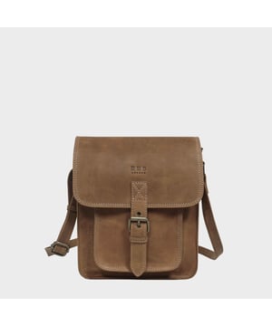 Introducing 'Carolyn', the ultimate luxury handbag crafted from the finest real leather. Featuring a sophisticated flap closure with magnetic fastening, 'Carolyn' is as beautifully structured as it is stylish, with three large compartments for all your essentials. Perfect for any occasion, 'Carolyn' is your perfect companion for effortless elegance. Secured magnetic flap closure. Opens to three roomy main compartments to slide in your tablet, ipad, notebooks and more. Fully lined interiors in natural beige polyester fabric. Zipped middle compartment to slide in your mobile phone, car keys, house keys and more. 
Full width back zip pocket provides extra space for organising your essentials. Lightweight. Mock buckle on the front for that designer sophisticated look. 
Slider adjustable leather shoulder handle for a comfortable carry. Graced with the Signature 'Real Hide Bag' insignia, the iconic RHB emboss is intricately etched into the exterior of the front flap. Fittings Colour: Antique Brass. Composition: Body: 100% Genuine Leather. Lining: Polyester.
DISCLAIMER : All pictures shown are for illustration purpose only. Actual product colour may vary due to different ambience lighting or the screen display settings. Size- W25cm x H21cm x D7cm.