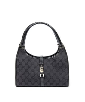Gucci Tassen Small Jackie  Schoudertas in de Zwart Doek in de Zilver  hardware. Het product is in In Zeer Goede Staat (AB).
  Afmetingen: 26x20x8 cm 
  Inclusief accessoires: None
      
  BrandCo Paris vindt zeldzame artikelen in de beste staat voor ongelooflijke prijzen. Het is de moeite waard om geduldig te zijn! Koop met vertrouwen: alle artikelen van BrandCo Paris worden zorgvuldig geselecteerd en geverifieerd door ons team van experts.

  Alle artikelen worden geleverd met een certificaat van echtheid en verpakt door BrandCo Paris.

  Classificatietabel voor de conditie van het artikel:

  N (als nieuw)
  AA (perfecte staat)
  A (uitstekende staat)
  AB (zeer goede staat)
  B (goede/redelijke staat)