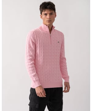 Designed in cotton with an all-over cable knit structure, this soft sweater has a regular fit and sporty half-zip collar. A preppy essential, it is detailed with our iconic GANT shield embroidered at the chest, and ribbed endings at the neck, hem and cuffs.
Regular fitHalf-zip collarCable knit structureGANT graphic embroidered at chest
 
100% Cotton
 