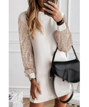 Premium quality fabric
  Sequin embellished design
  Round neckline
  Long puff sleeves
  Loose fit shift dress
  Falls above the knees
  Ideal for formal events and parties
Material: 90% Polyester 10% Elastane