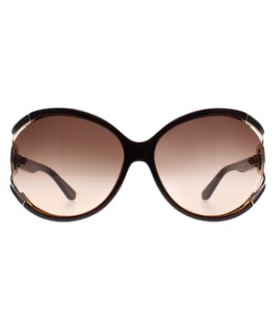 Las gafas de sol Salvatore Ferragamo Round Womens Dark Brown Grey Gradient SF600S presentan un diseño contemporáneo con una montura chic. Combinando estilo y comodidad, estas gafas de sol ofrecen una protección UV superior para cualquier ocasión.