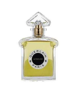 Discover the enchanting Guerlain Mitsouko Eau de Parfum Spray, a luxurious fragrance that has captivated hearts for over a century. This exquisite chypre and fruity scent features a harmonious blend of succulent peach and elegant floral notes of rose and jasmine. The fragrance's depth is enhanced by a tantalizing base of spicy underbrush and vetiver, making it a true olfactory masterpiece. Elevate your fragrance collection with Mitsouko, a timeless symbol of sophistication and allure.
