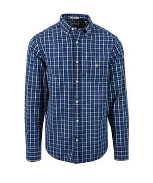Gant Reg Indigo Check Shirt in Dark Indigo
Elevate your casual wardrobe with the timeless appeal of the Gant Reg Indigo Check Shirt. Crafted from premium cotton, this shirt offers both comfort and durability, making it a reliable staple for everyday wear. The classic check pattern in a rich dark indigo hue adds a touch of sophisticated style, while the regular fit ensures a relaxed and comfortable silhouette.
 
Features

Premium Cotton: Made from high-quality cotton for superior comfort and breathability.   
Classic Check Pattern: Timeless indigo check design for a versatile and stylish look.   
Dark Indigo Wash: Rich, deep indigo colour that adds depth and character.
Regular Fit: Comfortable and relaxed fit.
Button-Down Collar: Offers a polished and refined appearance.   
Chest Pocket: Practical chest pocket for added convenience.   
Buttoned Cuffs: Adjustable buttoned cuffs for a personalised fit.   
Gant Logo
Versatile Style: Perfect for casual occasions and can be easily paired with jeans, chinos, or shorts.
Style code: 3250046