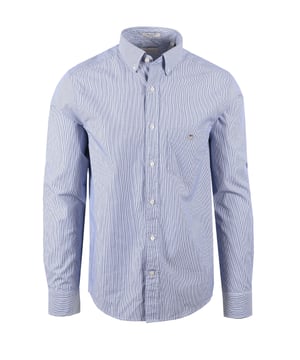 Gant Reg Dobby Dot Stripe Shirt in College Blue
Elevate your casual style with the Gant Reg Dobby Dot Stripe Shirt in College Blue. This refined shirt seamlessly blends classic design with subtle textural details. Crafted from premium 100% cotton, it features a unique dobby dot and yarn-dyed stripe pattern, adding depth and visual interest to your look.   
 
Designed for a comfortable regular fit, this shirt boasts essential features, including a smart button-down collar, a practical chest pocket, and adjustable cuffs for a personalized fit. The curved hem ensures a polished finish, whether tucked in or worn loose.   
 
Attention to detail is paramount, with recycled polyester buttons reflecting a commitment to sustainability. The iconic GANT shield graphic, delicately embroidered at the chest, adds a touch of signature style.

 
Features

100% Premium Cotton
Dobby Dot and Yarn-Dyed Stripe Design
Regular Fit
Button-Down Collar
Chest Pocket
Adjustable Cuffs
Curved Hem
Recycled Polyester Buttons
Embroidered GANT Shield Graphic
Style code: 3250081