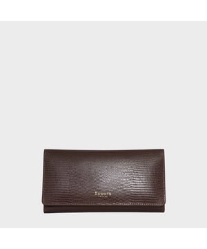 The ‘Claire’ flapover ladies purse is handcrafted with the premium lizard textured leather to give that designer look. Equipped with RFID technology, this practical ladies purse features a magnetic fastening closure with plenty of room to organise your cash, cards and coins. This large leather ladies purse is perfect to compliment your handbag and fits in easily. Stay safe and organised with ‘Claire’ the perfect addition to your collection of purses ideal for all outfits and occasions.
Secured flap over magnetic fastening closure to store your essentials safely and securely. Foldover flap design. Equipped with RFID technology for safety.
Additional back zip pocket to ensure you don’t run out of space. Two note compartments. Eight internal card compartments. Two windowed ID slots.
Assots branded lined interiors. Lightweight for easy carry. Fittings Colour: Clean Brass. Composition: Body: 100% Genuine Leather. Lining: 100% Cotton.
DISCLAIMER : All pictures shown are for illustration purpose only. Actual product colour may vary due to different ambience lighting or the screen display settings. Size - W20cm x H10.5cm x D2.5cm.