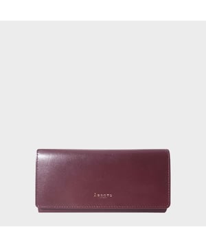 The ‘Claire’ flapover ladies purse is handcrafted with the Assots premium 'Giovani' Italian Polished vegetable tanned leather. Equipped with RFID technology, this practical ladies purse features a magnetic fastening closure with plenty of room to organise your cash, cards and coins. This large leather ladies purse is perfect to compliment your handbag and fits in easily. Stay safe and organised with ‘Claire’ the perfect addition to your collection of purses ideal for all outfits and occasions. Secured flap over magnetic fastening closure to store your essentials safely and securely. Foldover flap design. Equipped with RFID technology for safety. Additional back zip pocket to ensure you don’t run out of space. Two note compartments. Eight internal card compartments. Two windowed ID slots.Assots branded lined interiors. Lightweight for easy carry. Fittings Colour: Clean Brass. Composition: Body: 100% Genuine Leather. Lining: 100% Cotton. DISCLAIMER : All pictures shown are for illustration purpose only. Actual product colour may vary due to different ambience lighting or the screen display settings. Size - W20cm x H10.5cm x D2.5cm.