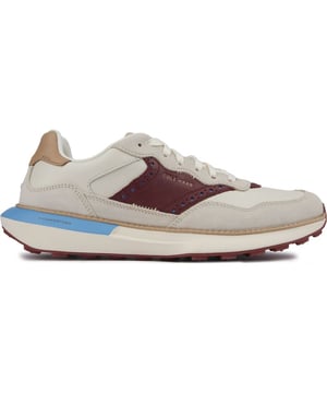 Eleva tu estilo con las zapatillas Cole Haan Grandpro Ashland, que combinan rendimiento atlético y estilo para correr. Confeccionados con gamuza suave y cuero con sutiles detalles de estilo brogue, cuentan con la tecnología Grand.OS liviana para brindar comodidad y flexibilidad. La entresuela de flowerfoam ofrece amortiguación y la suela de goma garantiza tracción. Con un elegante logotipo de Cole Haan, estas versátiles zapatillas pasan sin problemas del gimnasio a la calle. Experimente la sofisticación deportiva con el Grandpro Ashland.
