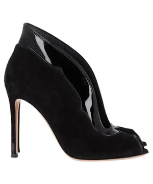 VINTAGE, RRP AS NEW
 The Gianvito Rossi Vamp Peep-Toe Ankle Boots in black suede and leather offer a sophisticated, seductive design with a perfect balance of elegance and edge. These boots feature a sleek silhouette, crafted from smooth black suede with leather detailing, and a daring peep-toe for a hint of allure. The stiletto heel adds a touch of height and sophistication, while the ankle-high design ensures a flattering, elongating effect on the legs. A must-have for the modern woman, these boots bring both versatility and luxury to your footwear collection.

Styling Tip:
Pair these chic ankle boots with a figure-hugging midi dress for an ultra-feminine, elegant look. For a more edgy style, wear them with skinny leather pants and an oversized blazer. The black suede and leather design makes these boots incredibly versatile, complementing both eveningwear and more casual outfits, giving you the perfect combination of style and sophistication for any occasion.

Gianvito Rossi Vamp Peep-Toe Ankle Boots in Black Suede and Leather

Condition: Very good
Signs of wear: Minor markings, Lightly used but very well maintained. Minor mark at soles & creasing, light scuffing at the soles and heels.
Packaging: None
Color: Black
Material:  Suede
Size: IT | 38
Measurements: Heel height: 90; Insole length: 200
SKU: NAPPUGBSH457554W