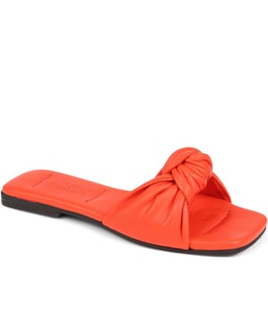 Spend summer with our Madelena mules. With their sleek leather design, cushioned footbed, and daringly minimalist silhouette, they're the perfect blend of elegance and simplicity.