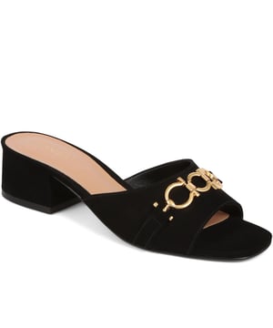 Step into effortless sophistication with these leather mules, accented with a gleaming golden chain for a hint of Jones elegance. Perfect for elevating your daytime look or complementing your evening ensemble, these heels are the epitome of chic versatility.