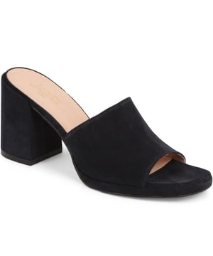 Slip into something a little more sophisticated with these leather mule sandals, boasting a luxurious suede upper and a just-right mid-height block heel. Perfect for weddings and elegant gatherings, these mules blend classic charm with contemporary chic, ensuring you step out in style.