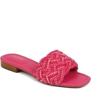 Slide into the textured embrace of these woven slide sandals, and channel artisanal charm and understated elegance. These are your go-to for a relaxed yet polished look that carries you through the summer with ease.